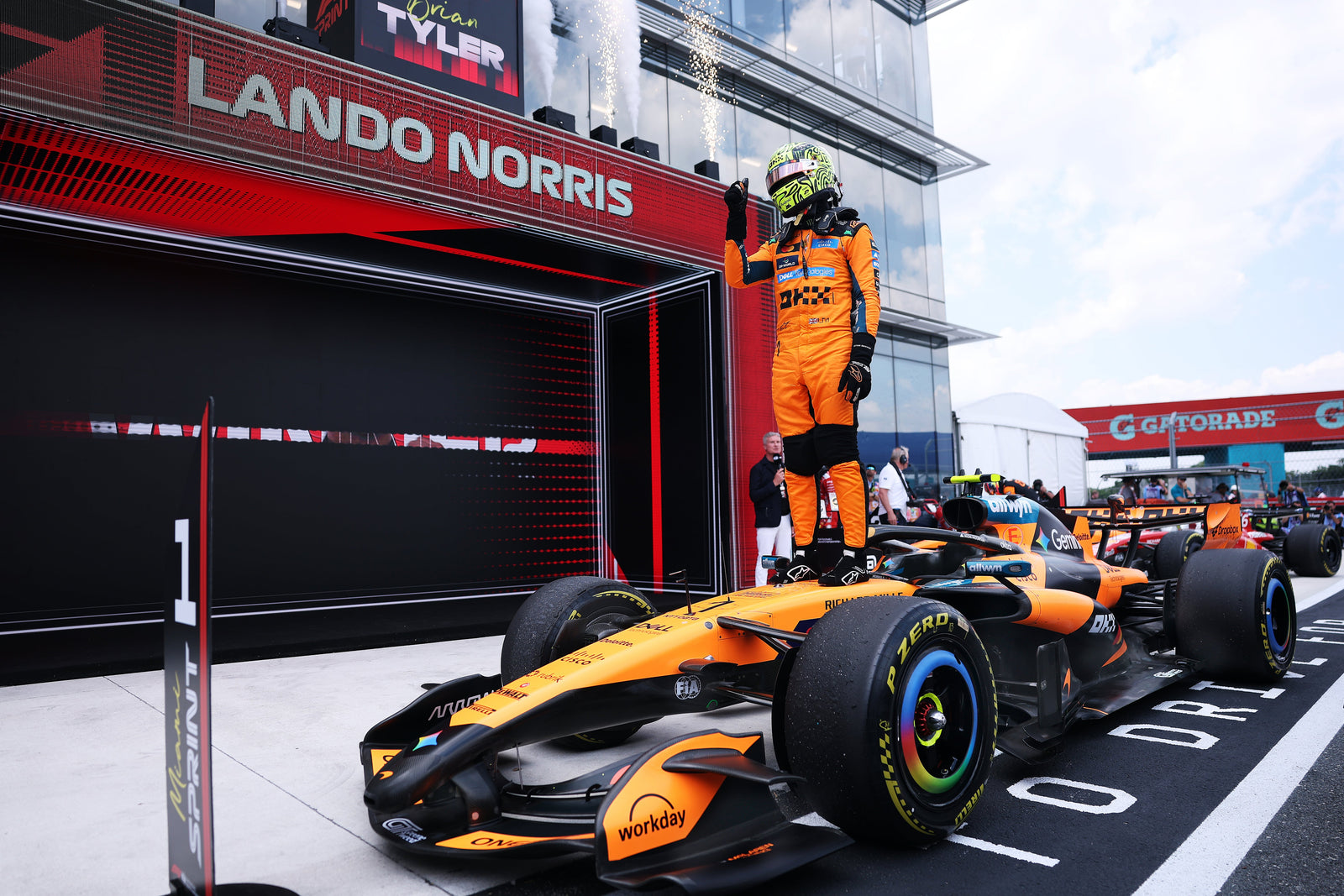 Lando Norris on the McLaren MCL39 in parc fermé